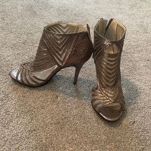CAPARROS NEW - never worn with tags silver/ metallic  heels size 6.5